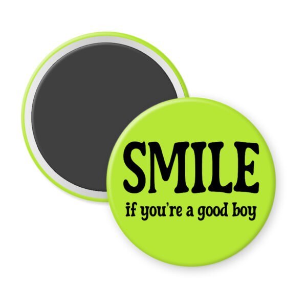 Green magnet with the text 'SMILE if you're a good boy' printed in black.