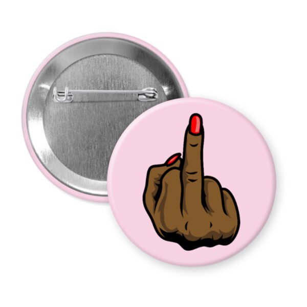 Pink button with a printed illustration of a brown melanin‑tone hand holding up a middle finger with a glossy red nail.