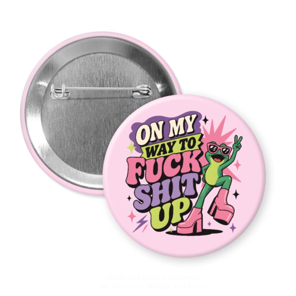 Pink pinback button with image of a frog and the text 'On my way to fuck shit up'.