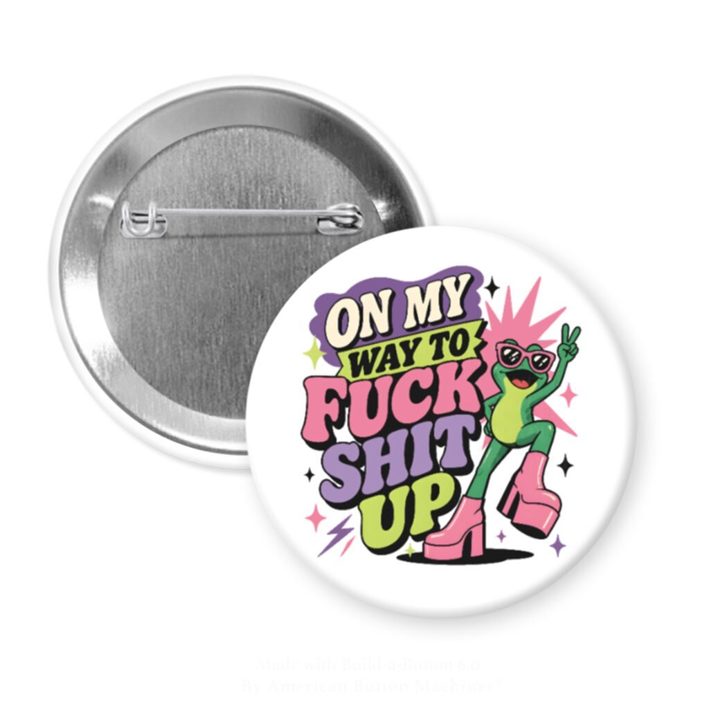 White pinback button with image of a frog and the text 'On my way to fuck shit up'.