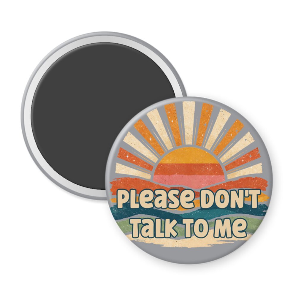 Grey magnet with image of a retro sunset and the text 'Please don't talk to me' printed on it.