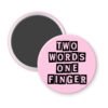 Pink magnet with the text 'TWO WORDS ONE FINGER' printed in black stencil font.