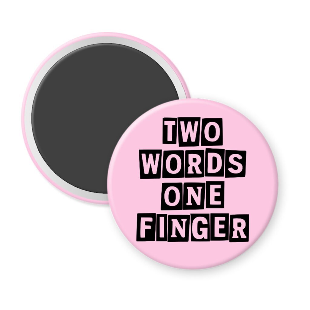 Pink magnet with the text 'TWO WORDS ONE FINGER' printed in black stencil font.