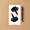 Sticker sheet with two black hand designs featuring red fingernails, showing middle‑finger gesture, placed beside a pen on wood surface.