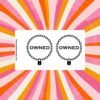 Sticker sheet on a wooden surface beside a black pen, featuring two identical circular chain designs with padlocks at the bottom and the word OWNED in bold black letters inside each circle. Vertical branding text on the left reads ShamelessGoods.com.