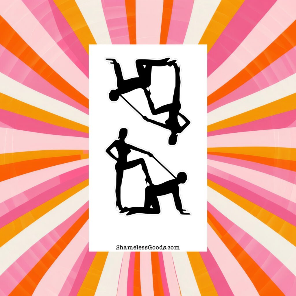 Sticker sheet on a wooden surface beside a black pen, featuring two black silhouette BDSM‑themed designs showing dominant‑submissive poses with leash detail. Branding at bottom reads ShamelessGoods.com.