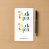 Rainbow “Fuck You” sticker sheet with colorful hearts and retro 90s aesthetic.