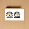 Sticker sheet with unicorns, rainbows, and the phrase “Everything Is Fucked” in bold black text.