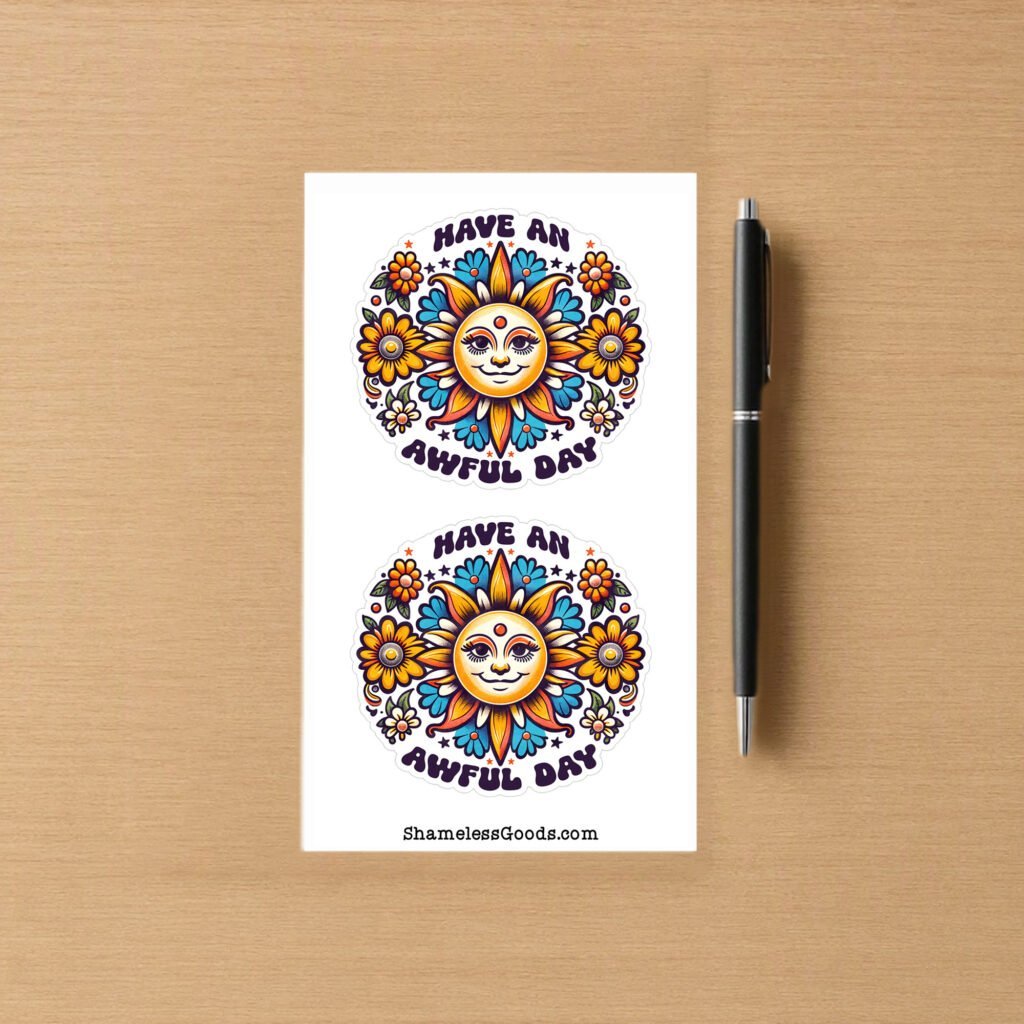 Sticker sheet with two round colorful designs showing a smiling sun surrounded by bright flowers and the text Have an Awful Day.